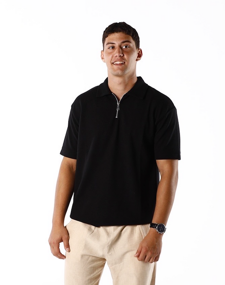 black polo and beige linen